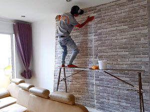Thi công giấy dán tường 3d giả đá - công trình nhà dân Quận 2
